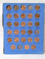 Front view of blue coin board displaying Lincoln cents 1980-2008