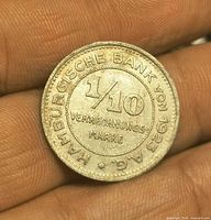 Obverse showing value 1/10 and issuing bank legend