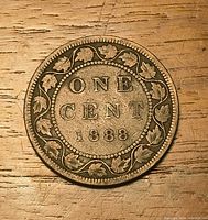 Reverse of 1888 Canadian large cent showing ONE CENT 1888 within maple leaf wreath