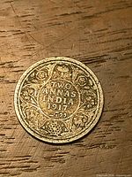 Reverse side showing denomination, date and design