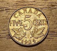 Reverse showing CANADA, 5 CENTS, maple leaves, date 1924