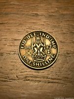 Reverse with crowned lion, shields and date 1947