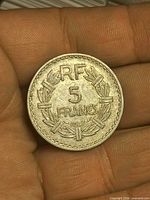 Reverse showing RF 5 FRANCS 1947 within laurel wreath
