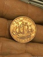 Reverse of 1959 half penny showing ship design