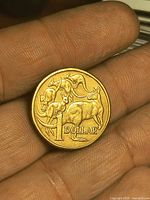 Reverse showing five kangaroos and denomination 1 Dollar