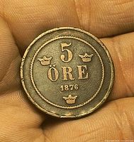 Obverse of 1876 5 Øre coin showing denomination, crowns and date
