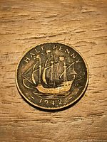 Reverse side showing ship design and date