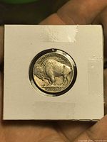 Reverse of 1935 Buffalo nickel in flip holder