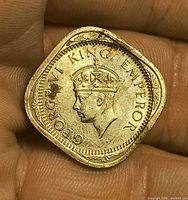 Obverse of 1941 India 2 Annas coin showing King George VI portrait