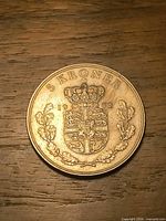 Reverse of Danish 5 kroner coin showing denomination, coat of arms and 1971 date