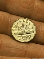 Reverse showing refinery design, denomination and dates