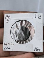 Obverse side of coin in holder showing date 1916 and Denver mintmark