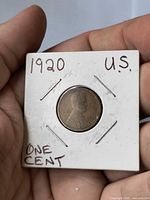 Obverse of 1920 Lincoln cent in flip showing date and profile