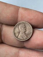 Obverse of 1921 Lincoln Wheat Cent in hand