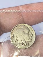 Obverse showing Native American profile and 1927 date