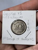 Reverse of 1940 Canadian 5-cent coin in 2x2 holder showing beaver design and date