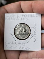 Reverse of 1965 Canada 5-cent coin showing beaver and date inside 2x2 holder