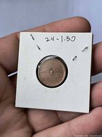 Reverse of 1967 Canadian 1 cent coin in cardboard flip