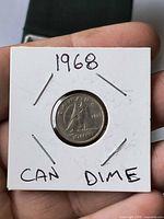 Reverse side of 1968 Canadian dime in labeled flip