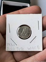 Obverse side: Bluenose schooner, date 1980 visible, holder inscription