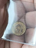 Obverse view showing George VI portrait and legend