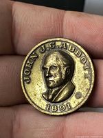 Obverse showing portrait, name and date