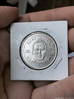 Obverse of Ricky Craven NASCAR 25¢ coin in 2x2 holder