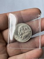 Obverse showing Morelos portrait, UN PESO legend and 1980 date