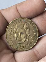 Obverse showing Wayne Gretzky portrait, NHLPA logo, McDonald's arches