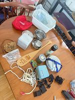 Overview of all camping items spread on table