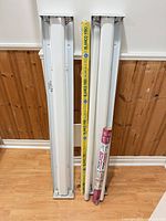 Two 4-ft strip fixtures with four T8 bulbs