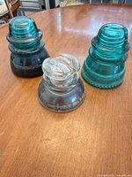 Group shot of three insulators showing colors and profiles