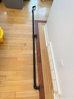 Full view of 80-inch black pipe handrail