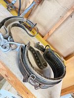 Climbing belt and safety strap on workbench