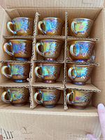 Box containing ten iridescent punch cups