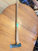 Full view of splitting axe on tabletop