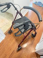 Overall view of burgundy BIOS rollator walker