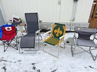 Group shot of all four chairs on snow