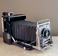 Left-front view of Crown Graphic camera showing bellows extended and lens board