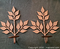 pair of leaf motif metal wall sconces