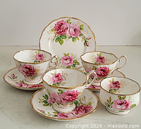 Set of four teacups, four saucers, one dessert plate, American Beauty pattern