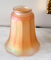 side view showing fluted body and fitter opening