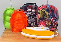 Group shot of lunch bags, snow molds and Crayola set