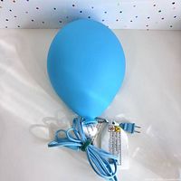 Entire lamp unlit with power cord and plug visible