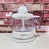 Juiceman juicer assembled with cover fitted