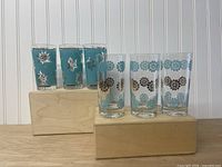 Front view showing all six glasses, two styles in groups of three