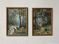 Both framed paint-by-number paintings side by side on wall