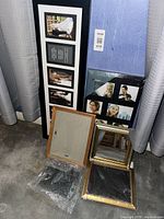 Group of six photo frames as described