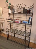 Full view showing overall structure and decorative scrollwork