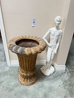 Overall view of sculpture and planter